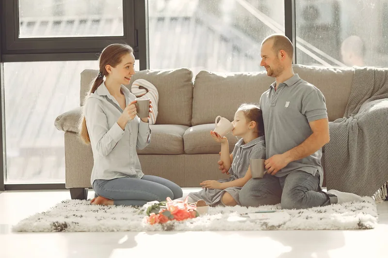 A family at home in their living room